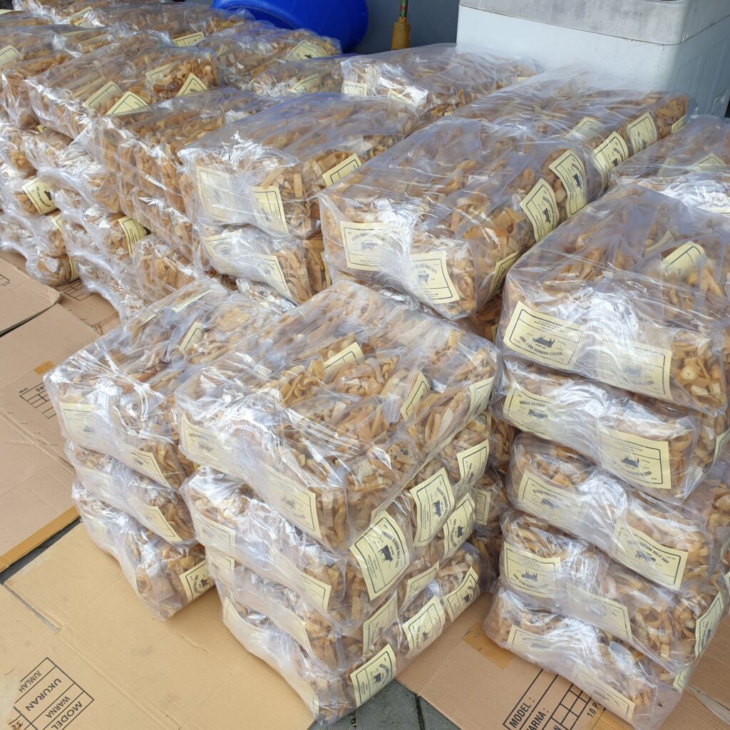 This image displays the packaged product of PT Sumber Rejeki Palawija's cattle skin cracker